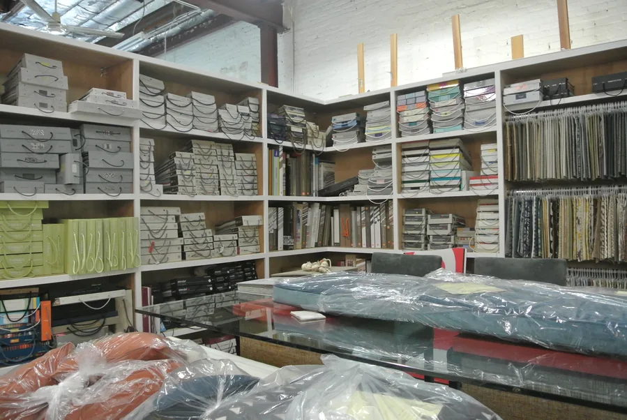 Fabric library in the reupholstery shop, New York, NY, by NYC Reupholstery