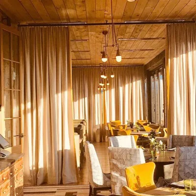 Restaurant dining room with custom drapery and seating, New York, NY, by NYC Reupholstery